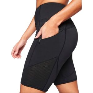 Athleta Contender 9” High Rise Mesh Zip Pockets Black Biker Shorts Size Medium